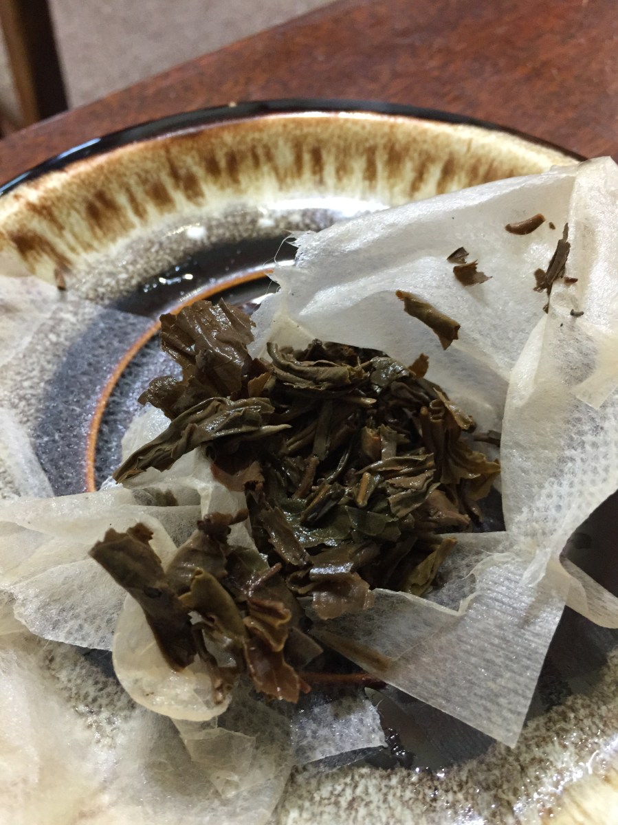 <a rel="license" href="http://creativecommons.org/licenses/by/4.0/"><img alt="Creative Commons License" style="border-width:0" src="https://i.creativecommons.org/l/by/4.0/88x31.png" /></a><br /><span xmlns:dct="http://purl.org/dc/terms/" href="http://purl.org/dc/dcmitype/StillImage" property="dct:title" rel="dct:type">Nan Nuo Shan Imperial Reserve Spent Tea</span> by <a xmlns:cc="http://creativecommons.org/ns#" href="http://parting.gifts" property="cc:attributionName" rel="cc:attributionURL">Jocilyn Mors</a> is licensed under a <a rel="license" href="http://creativecommons.org/licenses/by/4.0/">Creative Commons Attribution 4.0 International License</a>.