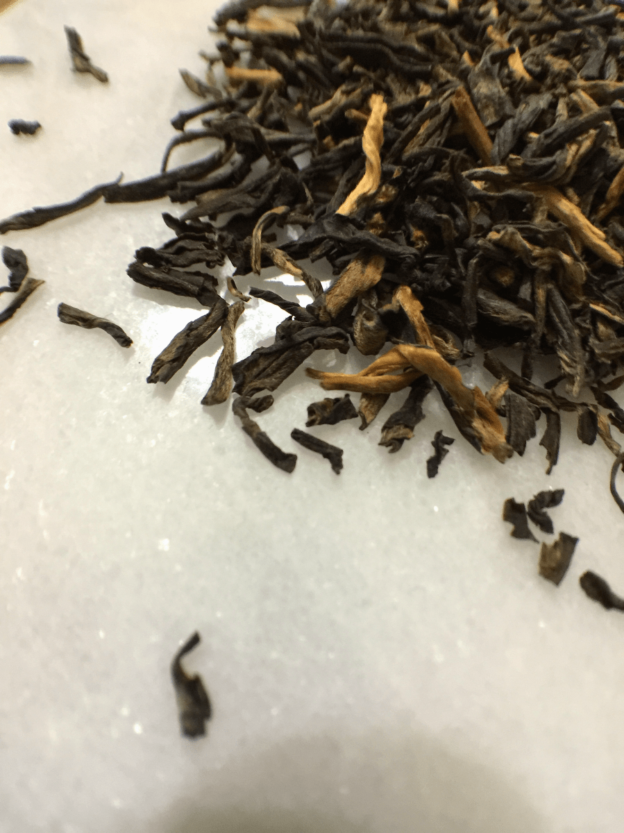 <a rel="license" href="http://creativecommons.org/licenses/by-sa/4.0/"><img alt="Creative Commons License" style="border-width:0" src="https://i.creativecommons.org/l/by-sa/4.0/88x31.png" /></a><br /><span xmlns:dct="http://purl.org/dc/terms/" href="http://purl.org/dc/dcmitype/StillImage" property="dct:title" rel="dct:type">Ying Ming Yunnan Extra Fancy (By the Pound): loose leaf Macro crop</span> by <a xmlns:cc="http://creativecommons.org/ns#" href="http://parting.gifts" property="cc:attributionName" rel="cc:attributionURL">Jocilyn Mors</a> is licensed under a <a rel="license" href="http://creativecommons.org/licenses/by-sa/4.0/">Creative Commons Attribution-ShareAlike 4.0 International License</a>.