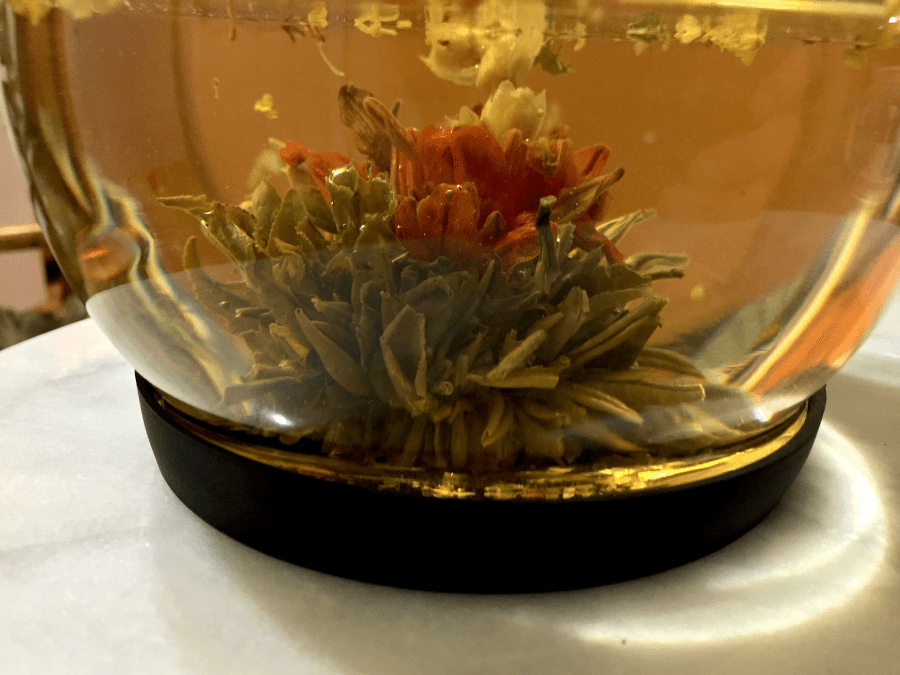 Three Flower Burst Tea (Eli): on Display B by Jocilyn Mors is licensed under a Creative Commons Attribution-ShareAlike 4.0 International License.