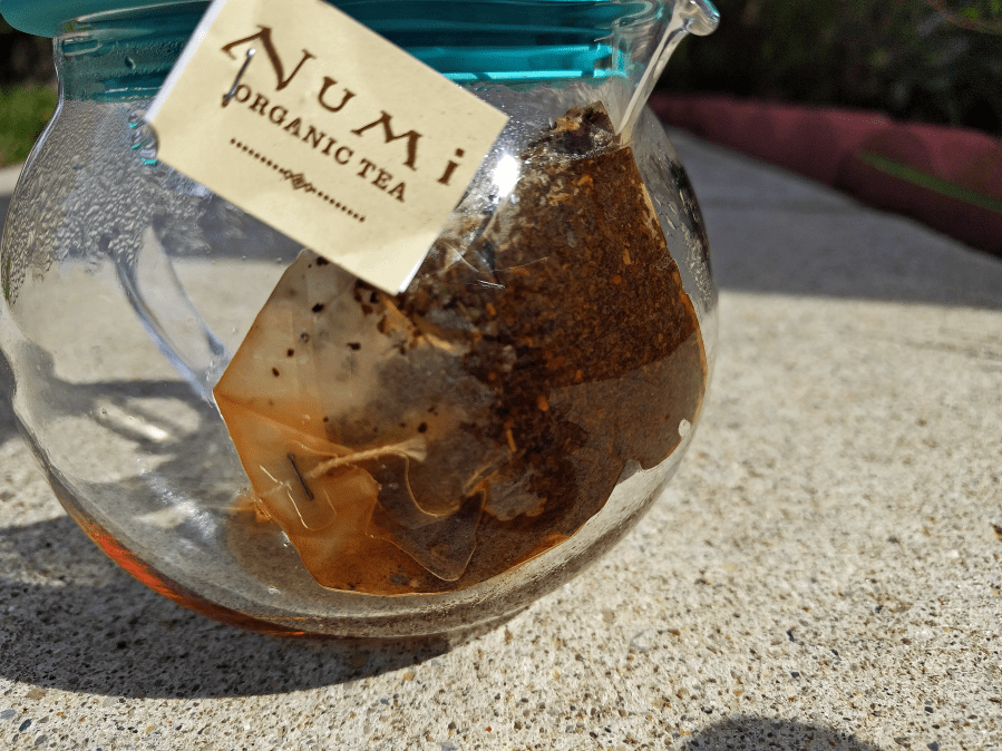 Basil Mint Pu-erh (Numi) ~ spent by Jocilyn Mors is licensed under a Creative Commons Attribution-ShareAlike 4.0 International License.